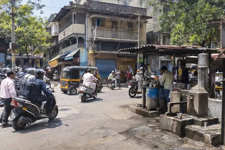 By day it is a working market. Most people in these photographs are buying computer parts.